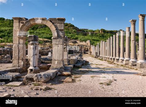 Arch Of Apollonius And Columns Of Collonnaded Street Ruins Of The Roman