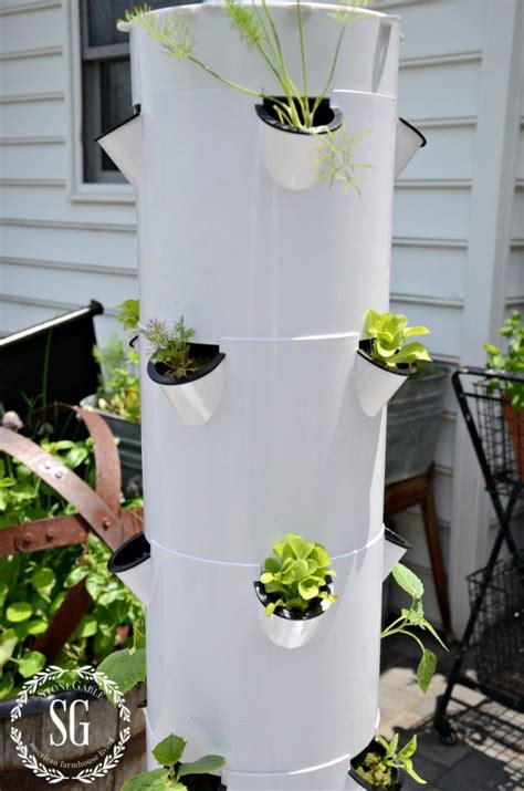 The Beauty And Bounty Of Tower Gardening Tower Garden Diy Vertical