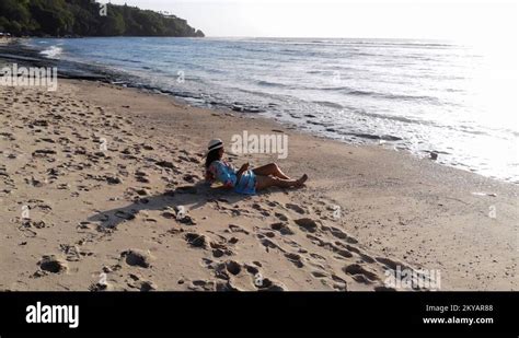 Aereal Drone View Of Young Pretty Woman In Sunglasses Lying On Tropical