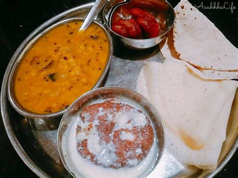 Authentic Odiyan Thali at Hotel Salma Bhubaneswar. Dalma Rice chapati a sweet similar to malpua ...