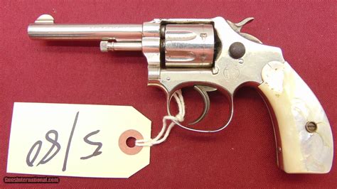 sold ---FIRST MODEL SMITH & WESSON LADY SMITH 22LR WITH PEARL GRIPS