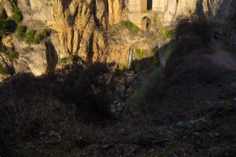 Premium Photo Waterfall Below The New Bridge Spanish Puente Nuevo