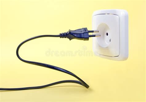 Inserting Power Cord Receptacle In Wall Outlet Stock Photo Image Of