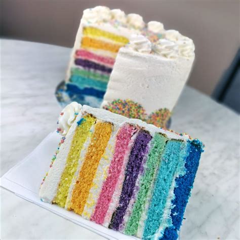 Tall Rainbow Cake - Quigleys