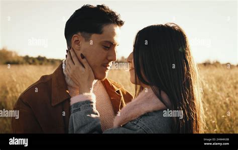 Couple Hugs Each Other outdoor At Sunset light Stock Photo - Alamy