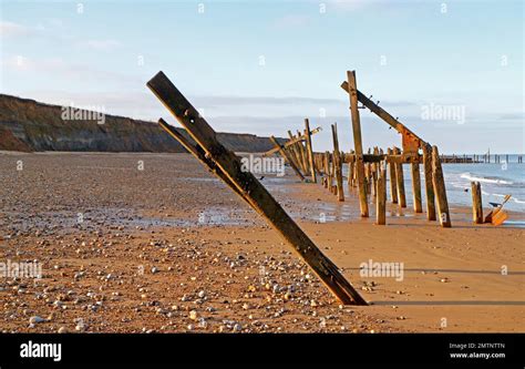 Abandoned Sea Defences With Continued Coast Erosion Landward To Soft