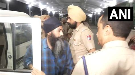 Watch Punjab Police Brings Amritpal S Close Aide Papalpreet Singh To Amritsar Airport After Arrest