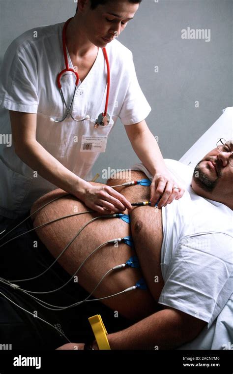 Obesity Clinic Male Patient Undergoing An Electrocardiography ECG