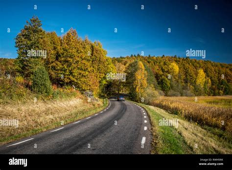 Country road in autumn Stock Photo - Alamy