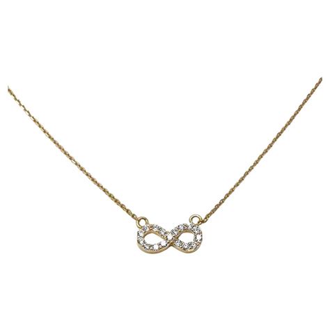 14 Karat Solid Gold Infinity Necklace With Natural Diamond Accent And