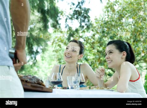 Family having cookout Stock Photo - Alamy