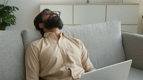 Premium Photo Tired Exhausted Freelancer Working With Laptop At Home