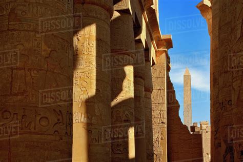 One of two Obelisks of Queen Hatshepsut viewed between columns of the ...