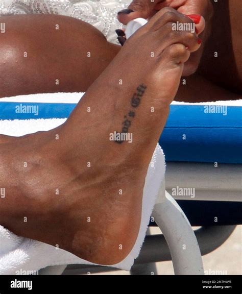 Kelly Rowland Relaxes On The Beach In A Purple Bikini Ahead Of Her Show