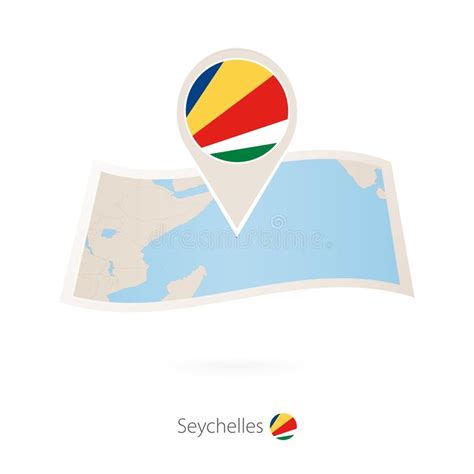 Mapa Doblado Del Papel De Seychelles Con El Perno De La Bandera De