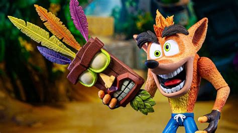 Neca Crash Bandicoot With Aku Aku Mask Deluxe Figure Toyark Photo