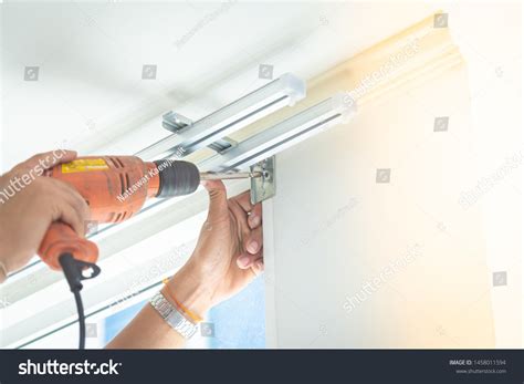 Curtain installer Images, Stock Photos & Vectors | Shutterstock