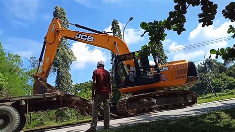 Excavator Naik Mobil Trado Youtube