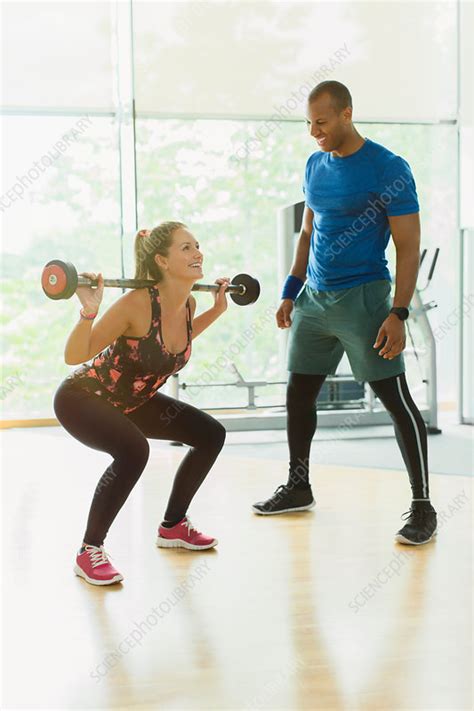 Barbell squats - Stock Image - F015/5740 - Science Photo Library