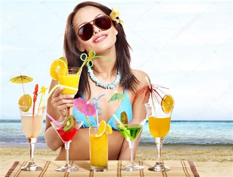 Girl In Bikini On Beach Drinking Cocktail Stock Photo Poznyakov