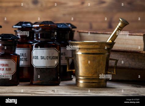 The Ancient Natural Medicine Herbs Medicines And Old Book Stock Photo