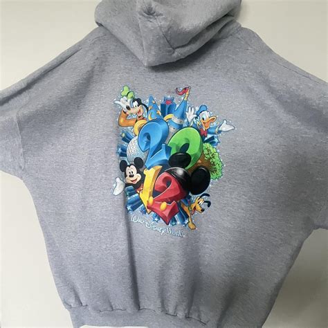 Vintage Disney zip up hoodie with print on back and... - Depop