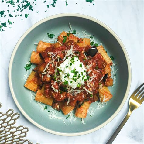 Rigatoni Alla Norma Eggplant Sauce Over The Spoon