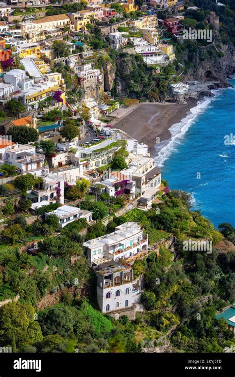 Touristic Town Positano On Rocky Cliffs And Mountain Landscape By The