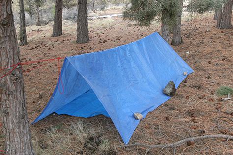 Video: How to make an emergency A-frame tarp shelter – Survival Common ...