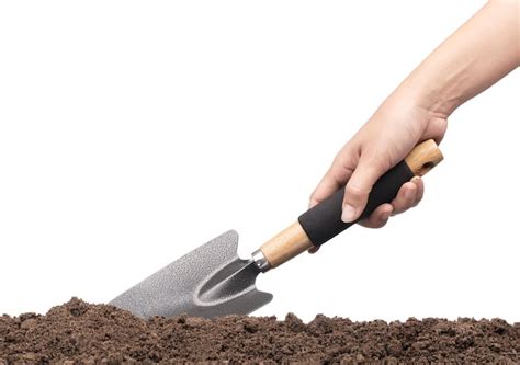 premium photo hand digging soil  shovel isolated  white background