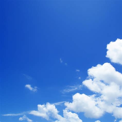 Premium Photo | A blue sky with clouds and a blue sky with a few clouds.