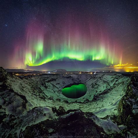 A Stunning View of the Northern Lights over Iceland Reflected in a ...