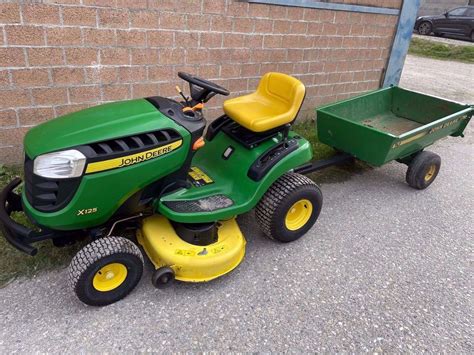 John Deere X125 Rasentraktor Anhänger Acheter sur Ricardo