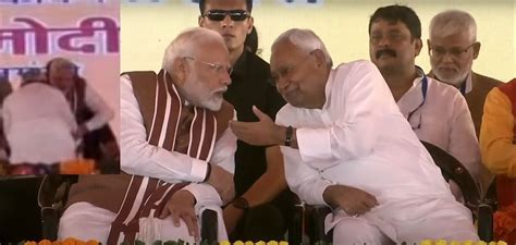 Bihar News Cm Nitish Kumar Bowed To Touch Pm Modi S Feet Bjp Minister