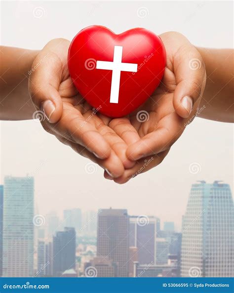 Close Up Of Hands Holding Heart With Cross Symbol Stock Image Image