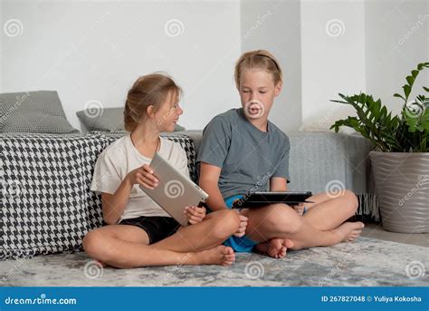 Two Kids Using Tablet Pc Stock Photo Image Of Portable 267827048