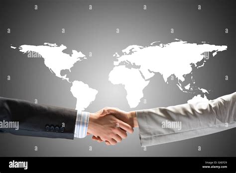 Two Businessmen Shaking Hands Stock Photo Alamy