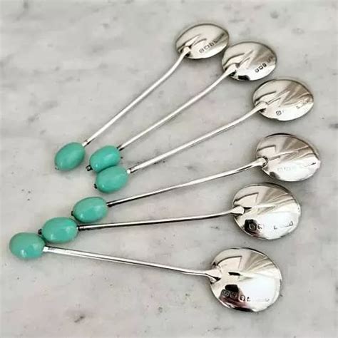 Set Of Green Coffee Bean Sterling Silver Spoons Dated In Antique