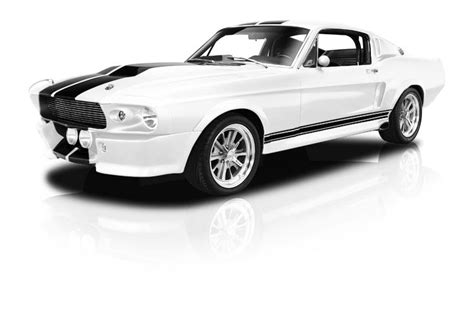 A White Mustang Muscle Car With Black Stripes