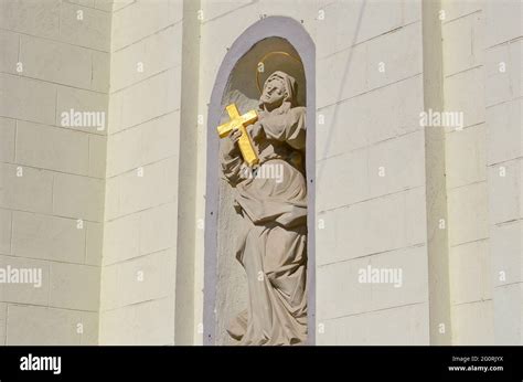 TERNOPIL, UKRAINE - MAY 29, 2021 - A statue decorates the facade of the ...