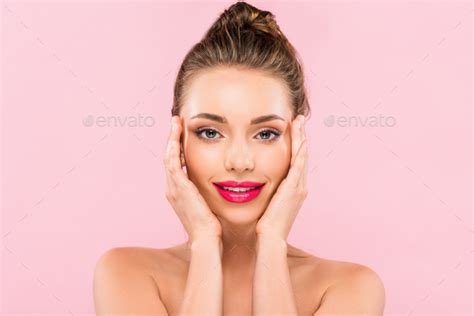 Naked Beautiful Woman With Pink Lips Posing With Hand On Face Isolated