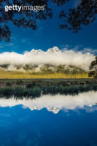 Mirror Lakes With Reflection Of Earl Mountains Fjordland National Park