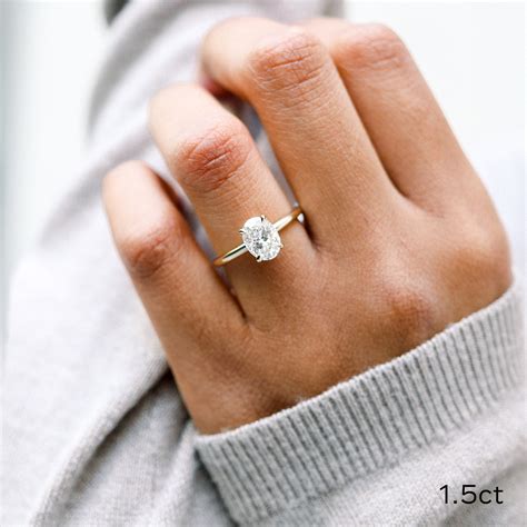 Oval Petite Four Prong Solitaire