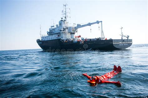 Rescue Marine Vessel During A Rescue Operation At Sea A Motor Boat