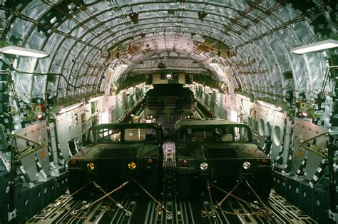 Inside the cargo bay of the C-17 Globemaster III shows two High ...