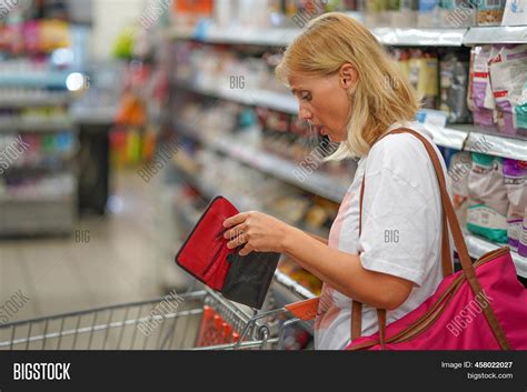 Woman Looks Wallet Image And Photo Free Trial Bigstock