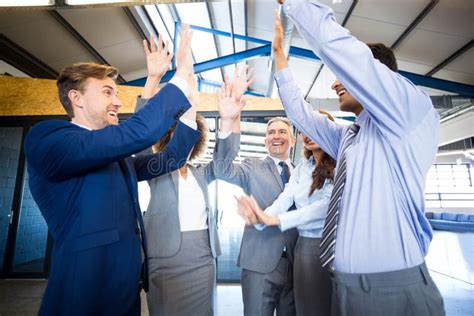 Happy Business Team High Fiving Stock Photo Image Of Classy Indian