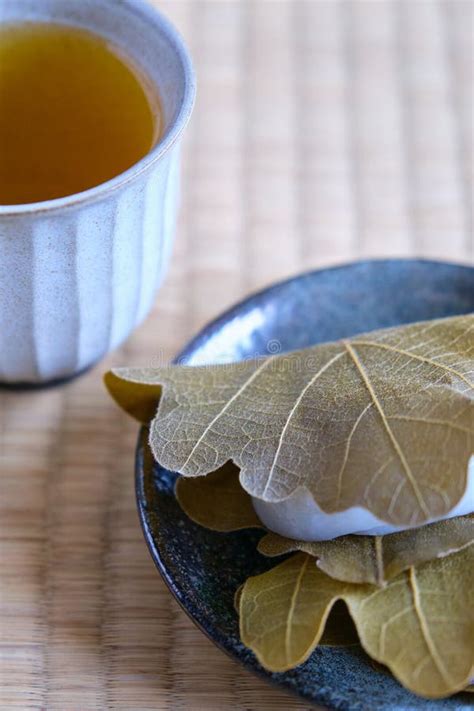 Japanese Kashiwa Mochi And Green Tea On Tatami Stock Photo Image Of