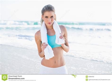 Relaxed Sporty Blonde In Sportswear With Towel Around Neck Stock Image