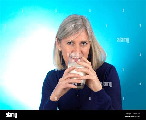 Mature Woman Drinking Milk Model Hi Res Stock Photography And Images